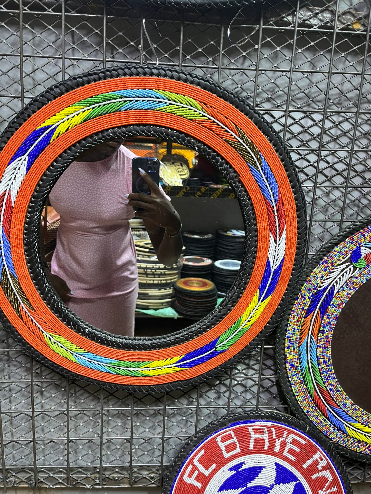 Mirror with beaded frame