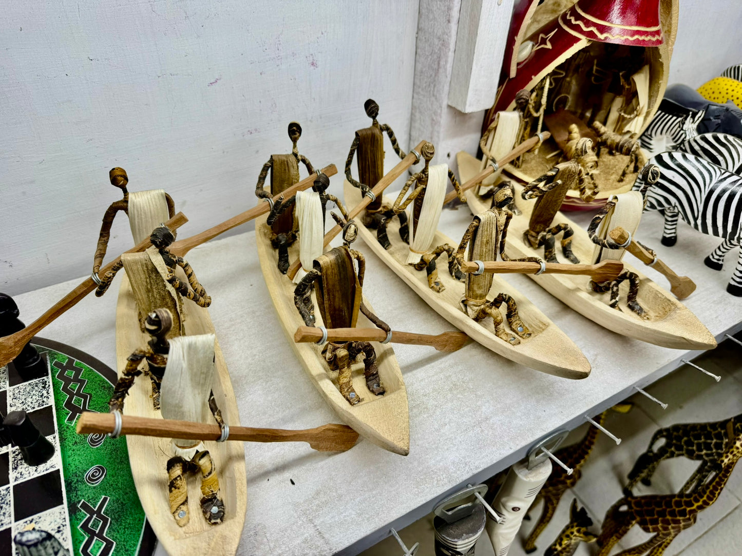Handcrafted African Rowing Boat Figurines – Per Piece